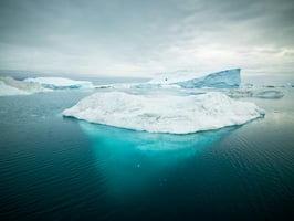 Arctic Icebergs in Ilulissat, Greenland. Photo by Alexander Hafemann. Unsplash.